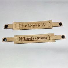 two wooden tags that say, the laugh bar and my therapy is a bathtub