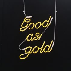 a neon sign that says good as gold