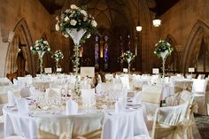 tables and chairs are set up for a wedding reception