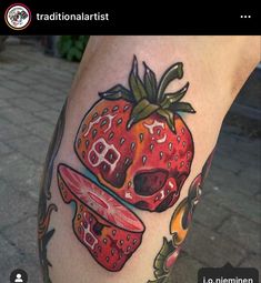 a tattoo with a strawberry and a knife on the side of someone's leg