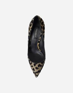 These Dolce & Gabbana leopard lurex heels pumps are a statement piece for any outfit. The luxurious design boasts stunning print, adding touch of elegance to your look. Expert craftsmanship and high-quality materials ensure comfortable stylish wear. Elevate wardrobe with Lori Print Pumps. Elevate Wardrobe, Leopard Print Pumps, Luxurious Design, Leopard Pattern, Heels Pumps, Pumps Heels, Timeless Elegance, Leopard Print, Dolce And Gabbana