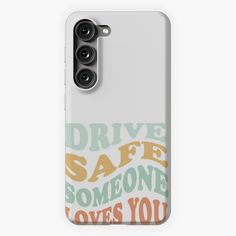 a white phone case with the words drive safe someone loves you in orange and green