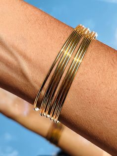 "High Quality Non Tarnish Celebration Bracelet Bangles. The perfect set to wear from day to night. Material: 18K Gold Filled- Non Tarnish- Hypoallergenic PLEASE READ: The Quantity selected will be the amount sent. Please note there is also the option to purchase just one. Inner Diameter Options: Approx. 2.375\" Average or 2.5\" (Large) Thickness: 1.5mm How to determine your bangle size: 1.Make a fist 2.Measure the distance between the center of your far left knuckle to that of your far right. Th Gold Bangle Set, Bracelet Stacking, Bangles For Women, Dainty Bracelet, Stacked Bangles, Alessandra Ambrosio, Gold Bangle, Dainty Bracelets, Vanessa Hudgens