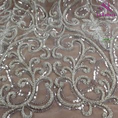 Price: The price is for 1 yard. if you buy more than 1 yard ,it won't be cut. will come in one piece the longest is 20 yards. Material: polyester,sequins,beads Fixed Wide : 130cm or 51 inches. color:Silver Want to see other colors and more similar Beading lace fabrics come to: https://www.etsy.com/shop/Randyfabrics?ref=hdr_shop_menu&section_id=14192305 Shipping: Choose the shipping way you need, if you want package shipped by express,please note the phone number on order. Use for Dress,cloth Silver Embellished Lace For Party, Glamorous Silver Dress With Intricate Embroidery, Silver Embroidered Lace For Party, Elegant Silver Lace With Sequins, Silver Sequin Fabric With Lace For Party, Silver Sequin Fabric With Lace Work For Party, Glamorous Embroidered Silver Sequin Fabric, Glamorous Silver Embroidered Sequin Fabric, Silver Fitted Lace Sequin Fabric