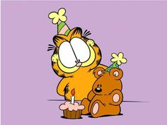 a cartoon cat with a birthday cupcake on it's head sitting next to a teddy bear