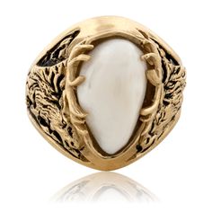 This elk head and antler ring is boldly and magnificently hand carved and individually created by the talented designers at Park City Jewelers to showcase your treasured elk's tooth ivory. Each unique elk ivory is carefully trimmed, perfectly fitted, and securely set beneath surrounding elk antlers in your choice of 14K yellow gold, 14K white gold, or 14K rose gold. This handsome elk mounting is sure to evoke memories of your exciting elk hunting years. Bold and ruggedly handsome, this finely cr Elk Ivory Ring, Elk Ivory Jewelry, Ivory Jewelry, Elk Head, Natural Gold Nugget, Elk Ivory, Ivory Ring, Tooth Ring, Deer Mounts