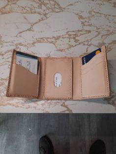 Handmade leather trifold wallet made to order. Available in your choice of colors. Brown Leather Hat, Leather Bucket Hat, Leather Trifold Wallet, Leather Hats, Leather Cap, Leather Bucket, Money Clip Wallet, Trifold Wallet, Top Grain Leather