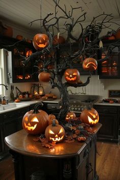 pumpkins are lit up in the shape of jack - o'- lanterns