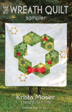 the wreath quilt sampler is featured in this book