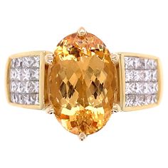 Simply Beautiful! Finely detailed Imperial Topaz and Diamond Platinum Cocktail Ring. Centering a securely nestled Hand set Oval Imperial Topaz, weighing approx. 7.52 Carat, either side with Diamonds, approx. 1.55tcw. Hand crafted 18K Yellow Gold mounting. Ring size 9.5, we offer ring re-sizing. Dimensions: 1.17” l x 0.97” w x 0.60” h. Ideal worn alone or as an alternative Engagement ring. The Ring is in excellent condition and was recently professionally cleaned and polished. More Beautiful in r Alternative Engagement Ring, Bracelet Tennis, Imperial Topaz, Gold Cocktail Ring, Gold Cocktail, Alternative Engagement Rings, Cocktail Ring, Simply Beautiful, Cocktail Rings