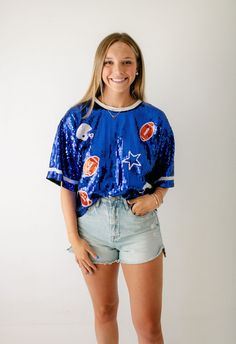 Get ready for game day with X's and O's Royal Blue Sequin Top! This top is not only fun, but also the perfect addition to your wardrobe. Pair it with your favorite shorts for a winning look! Fits true to size, Morgan is wearing a medium. She is 5'7, a size 6 and a 34C Blue Sequin Top, Buddy Love, Mink Pink, Dress Gift, Sequin Top, Sale Design, Game Day, Get Ready, Summer Collection