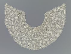 A Bertha collar is a wide, flat round collar, often of lace or sheer fabric, for a dress with a low neckline and designed to accent a woman’s shoulders in the Victorian era. This cotton Bertha collar is of Irish Crochet, and is believed to be from Ireland c. 1890-1909. Diverse scattered flowers and shapes include roses, daisies, circles and ovals inside with three-part arches on the outer edge of the collar. Amsterdam Home, Bertha Collar, Dutch Masters, Ribbon Ornaments, Antique Fashion, Lace Gloves, Pearl And Lace, Natural Fibres