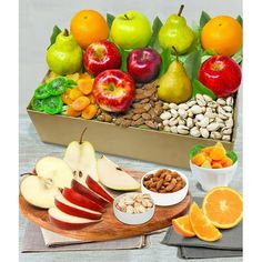 an assortment of fruits and nuts in a box