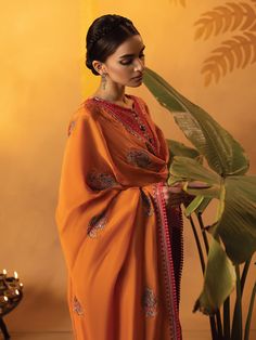 Brand: Faiza FaisalProduct Code: Ilse | 3 PC StitchedCollection: Faizal Faisal Signature Pret Festive Collection DESIGN DETAILS: Shirt:Organza Inner: Thai Silk Dupatta:Medium Silk Trouser:Thai Silk Goan Description Small Medium Large Front Length 50 50.0 50 Sleeve Length 22.0 22.5 23 Sleeve Opening 5.0 5.5 6 Border Hem 28.0 29 30 Shoulder 14 14.5 15.5 Bust 19.0 20.0 22 Hip 23.5 24.0 25 Shirt Description Small Medium Large Front Length 47.0 47 47 Border Hem 26.5 27.5 28.5 Shoulder 14 14.5 15.0 Bust 19 20.0 22 Hip 23.0 24.0 25 Trouser Trouser Length 34 34.5 35.0 Trouser Waist 14 14.5 15 Trouser Bottom 12.0 12.5 13.0 DISCLAIMER: Lining, Laces, and Tassels are not included in unstitched variants. Embellishment items in stitched outfits are subject to market availability The actual colors of th Organza Suits, Thai Silk, Chiffon Collection, Silk Trousers, Eid Collection, Silk Dupatta, Fashion Consultant, Fabric Stores Online, Designer Suits