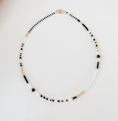 Long Seed Bead Necklace, Black And White Bead Necklace, White And Black Beaded Necklace, White Beaded Choker Necklace With Colorful Beads, Black And Gold Seed Bead Necklace, Adjustable Black Choker With Colorful Beads, Beaded Chocker, Gold Gemstone Necklace, Black White And Gold