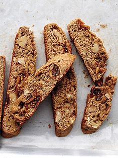 several pieces of bread with nuts on top