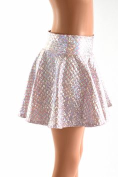 "This item is made to order, please read all the way through the listing before purchasing! Silvery scales shimmer on baby pink in this holographic mini skirt. This fabric has such a gorgeous sparkle and shine! It is made of four way stretch lycra spandex. It has a soft, spandex waistband (elastic free) that sets at the natural waist. Need help choosing \"Length\"? Watch this video: https://www.youtube.com/watch?v=qTKmmJGrjW8&t=1s Womens Sizing (See below for instructions on where measuremen Pink Fitted Skirt For Costume Party, Fitted Pink Skirt For Costume Party, Glamorous Fitted Pink Skirt, Summer Party Mermaid Bottoms, Fitted Metallic Disco Skirt, Metallic Fitted Disco Skirt, Fitted Pink Skirt For Dance, Summer Princess Style Fitted Skirt, Fitted Pink Sequin Skirt