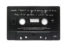 an old black cassette with writing on it