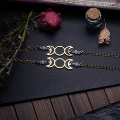 ☽STORY☾ Name: ✮goodness moon✮ the three phases of the moon, the goddess, divination. An ancestral symbol of witchcraft and divination, it's up to you to test it. ☽DESCRIPTION☾ *Czech glass beads *stainless steel chain * triple moon in brass ☽TIPS FOR USE☾ Over time, brass oxidizes. You can restore shine to your jewelry by rubbing it with a dry cloth. To preserve it as best as possible, avoid contact with sea or swimming pool water, perfume and store it away from humidity and the sun. I also recommend taking them off to sleep. ☽DIMENSIONS☾ Guaranteed lead-free, nickel-free, cadmium-free total length 16cm + 5cm extension chain. ☽DELIVERY☾ ✩Delivery costs are included for mainland France. Available from 35 euros for abroad ✩Sending by letter followed for France and abroad for orders of less t Spiritual Moon Phase Bracelet Jewelry, Spiritual Moon Phase Bracelet, Spiritual Gold Bracelets With Moon Phase Detail, Spiritual Gold Bracelets With Moon Phase, Water Perfume, Swimming Pool Water, Moon Bracelet, Phases Of The Moon, Triple Moon