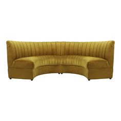 the curved couch is made from yellow velvet