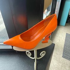 New Stand Out In These Comfy Pump Style Dollar Sign Heel! Make Your Outfit Pop With These Eye Catching Pumps! Set Price! All Closet Items Are Boutique Quality And Brand New. Listed Prices Are Non Negotiable With The Exception Of Bundles. :) Orange Heels With Sculpted Heel For Spring, Casual Orange Heels With Padded Heel, Casual Orange Heels For Party, Orange Pumps, Nice Sandals, Dollar Sign, Black Cape, Espadrilles Platform, Low Heel Sandals