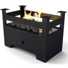 a black fire pit sitting on top of a table