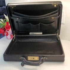 Pre-Owned Vintage And Hard To Find Briefcase 100% Authentic And Luxurious Mens Hartmann Black Leather Briefcase 3 Number Combination Main Closure (274) Interior Has Plenty Of Slip-In Compartments Size : 18"L X 13"H X 4"W (Large Size Briefcase) Quality On These Briefcases No Longer Made Used With Visible Signs Of Usage But Nothing Serious That Affects Its Luxurious Looks And Purposes, Still In Great Condition **No Dust Bag** Please See Pictures Up-Close For Best Description Of Item Being Sold And Vintage Rectangular Business Briefcase, Black Rectangular Briefcase With Gold-tone Hardware, Number Combinations, Luxury Black Leather-lined Briefcase, Vintage Leather-backed Rectangular Briefcase, Black Leather Briefcase, Vintage Brown Leather Briefcase, Rectangular, Leather Briefcase, Passport Cover