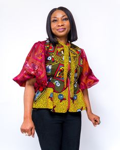 African print, peplum top. Can be worn on any pants or skirts. Fancy front zip. Elbow length puff sleeve lined with burgundy chiffon fabric. Fully lined with skin friendly lining. Fall Patchwork Short Sleeve Blouse, Short Sleeve Patchwork Tops For Party, Party Tops With Patchwork And Short Sleeves, Patchwork Short Sleeve Tops For Party, Party Patchwork Short Sleeve Tops, Party Tops With Gathered Short Sleeves, Fitted Multicolor Blouse With Balloon Sleeves, Multicolor Fitted Blouse With Balloon Sleeves, Fitted Multicolor Balloon Sleeve Blouse