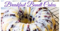 a blueberry bundt cake on a cooling rack with the words, breakfast bundt cakes