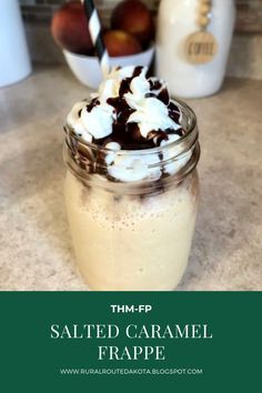 salted caramel frappe in a mason jar with whipped cream and chocolate on top