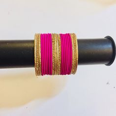 Brand New 22 Pieces Beautiful Hot Pink & Gold Color Fusion Meral Bangles Set Indian Pakistani Bracelets, It Also Contains 4 Thick Cubic Zirconia Studded Bangles, Which Can Also Be Worn Separately Available In Size Small 2.4 Size Which Fits Small Wrists. Check The Last Picture For Indian Bangles Size Reference Great For Wedding, Haldi, Sangeet, Indian Pakistani Weddings, Events, Social Gathering Or Festivals. More Colors Available, Check Out Other Listings. Bundle To Get Huge Discount. Free Gift Festive Pink Bangle For Celebrations, Festive Pink Bracelet, Pink Festive Party Bangle, Festive Pink Party Bangle, Bollywood Style Pink Bangle For Diwali, Traditional Pink Bangle For Party, Pink Bangle Jewelry For Diwali, Cheap Traditional Pink Bangle, Pink Bollywood Bangle For Party