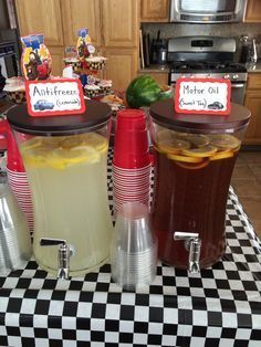 three different types of drinks on a checkered table