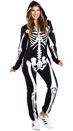 a woman wearing a skeleton costume