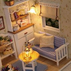 a doll house living room with furniture and accessories