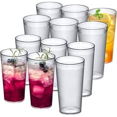 there are many glasses with different drinks in them