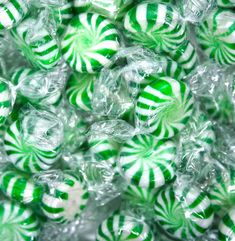 many green and white striped candy balls