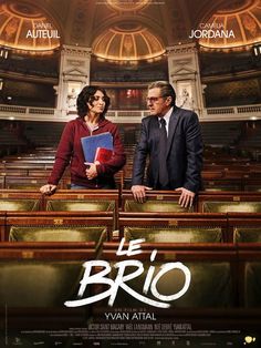 the movie poster for the film le brio with two people standing in an auditorium