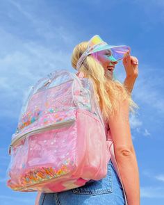 Add some Flower Power to your school or workday with this best-selling confetti backpack! Available in two sizes, this heavy-duty clear vinyl backpack features our multicolored Flower Shop confetti and is sure to brighten your day. Available in medium and large sizes Clear vinyl backpack with Flower Shop confetti Front pocket and 2 exterior water bottle pockets Pink nylon adjustable straps & top handle Luxe silver finishes and hardware (LARGE SIZE) Dimensions: 14"W x 6.5"D x 18"H (MEDIUM SIZE) D Light Pink Backpack, Clear Backpack, Pink Backpack, Clear Vinyl, Strap Tops, At School, Brighten Your Day, Flower Shop, Flower Power