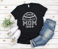 This baseball mom t-shirt is everything you’ve dreamed of and more. It feels soft and lightweight, with the right amount of stretch. It’s comfortable and flattering for all.  • 100% combed and ring-spun cotton (Heather colors contain polyester) • Fabric weight: 4.2 oz./yd.² (142 g/m²) • Pre-shrunk fabric • Side-seamed construction • Shoulder-to-shoulder taping • Blank product sourced from Nicaragua, Mexico, Honduras, or the US Tee Ball Mom, Sports Mom Gifts, Tee Ball, Ball Ideas, T Ball, Women Baseball, Glitter Shirt, Balls Shirt