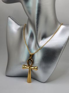 Ankh Necklace / Big Ankh / Gold Ankh / African Ankh / African Jewelry BIG Ankh Necklace has bold large pendant. Made of Stainless Steel. Gold Plated. This is a Quality-made Necklace. Comes in several chain lengths! Ships fast! Luxury Gold Ankh Necklace, Ankh Jewelry, Invisible Locs, Chain Ideas, Dope Jewelry Accessories, Ankh Necklace, Hippie Aesthetic, Necklace Big, Y2k Accessories