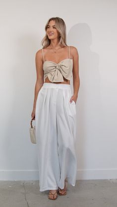 Elevate your summer wardrobe with these white wide-leg pants. Crafted from breathable fabric, they offer both style and comfort for those warm days ahead. Features: White Pants Linen Wide Leg 79452 P3-6 Linen Jeans Outfit, Chic Wide Leg Pants For Vacation, White Ankle-length Summer Pants, White Summer Ankle-length Pants, Elegant Summer Wide Leg Beach Pants, Summer Loungewear Wide Leg Pants, Chic Wide Leg Summer Pants, White Versatile Pants With Elastic Waistband, Wide Leg Pants With Pockets For Day Out