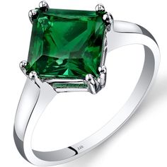 What Emerald dreams are made of This Emerald ring is an enchantingly easy-to-wear shade of green, blurring the lines between reality and dreams. This standout ring features a princess shape Peora created Emerald gemstone in 14K white gold. Responsibly sourced in every sense, our created Emerald gemstones are physically, chemically, and optically identical to their natural counterparts. We're big fans of eco-luxury. Handcrafted in pure 14K white gold goodness, this ring has been carefully coated in an elegant rhodium finish. Our artisans are expertly trained in this process which fortifies the ring's strength, shine and brilliance. Shopping for birthdays, bridal parties or other occasions? Our concierge stylists are here to help with all of your jewelry questions. Each purchase comes beauti Emerald Solitaire Ring, Jewelry Questions, Classic Solitaire Ring, White Gold Solitaire, Gold Solitaire Ring, Lab Created Emerald, Princess Cut Rings, Emerald Ring, Jewelry Gift Box