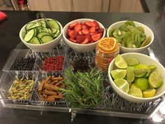 several bowls filled with different types of fruits and vegetables