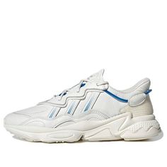 The adidas Ozweego 'White Blue Bird' is a modern take on a classic design. Featuring a tumbled leather upper in an off-white hue, with blue tubing inspired by the lacing system of the original Ozweego 3, this shoe is both stylish and comfortable. A Velcro heel overlay allows you to customize the look of the shoe with interchangeable patches, while the Adiprene+ cushioning provides superior comfort. Adidas Leather Sneakers For Light Sports, Adidas Leather Sneakers For Casual Sports, Modern White Adidas Sneakers, Modern Adidas Leather Sneakers, Adidas Ozweego White, Adidas Originals Ozweego, Adidas Ozweego, Marathon Running Shoes, Marathon Running