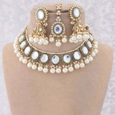 Gold Rodium Polish White and Off White color Necklace in Metal Alloy studded with Kundan, Pearl Luxury White Kundan Necklace With Stone Work, Luxury White Kundan Necklace With Intricate Design, Luxury White Kundan Sets, Luxury Traditional Dual-tone Necklaces, Luxury White 22k Gold Kundan Necklace, Luxurious Antique Temple Necklace For Ceremonial Occasions, Luxury 22k Gold White Kundan Necklace, Maroon Necklace, Violet Necklace