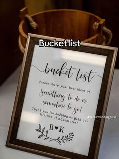 a bucket with a sign that says bucket list