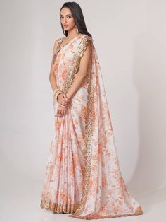 Are you in search of the perfect saree to wear to your next party or event? Look no further than our "Gorgeous White Digital Printed Organza Party Wear Saree With Blouse!" Comfortable and stylish, this saree is the perfect addition to any wardrobe.
With its comfortable and lightweight organza fabric, you'll be able to move and dance freely throughout any occasion. The digital print and sequin embroidery add an elegant touch, making it perfect for any formal event
This saree includes a fully unst Printed Organza, Floral Print Sarees, Organza Blouse, White Saree, Party Kleidung, Trendy Sarees, Anushka Sharma, Printed Saree, Organza Saree