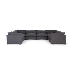 the sectional sofa is made out of grey fabric