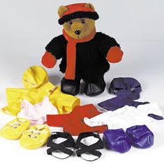 a teddy bear is surrounded by pairs of shoes