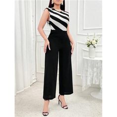 -Item Id 38917395 -Details: Belted, Zipper -Neckline: Round Neck -Style: Elegant -Waist Line: High Waist -Color: Black -Pattern Type: Striped -Type: Unitard -Jumpsuits Sleeve Length: Sleeveless -Jumpsuits Length: Short -Fit Type: Regular Fit -Fabric: Slight Stretch -Jumpsuits Material: Fabric -Jumpsuits Composition: 100% Polyester -Care Instructions: Machine Wash Or Professional Dry Clean -Jumpsuits Body: Unlined -Sheer: No **Open To Offers!!!** **Bundle To Save More** **30% Off Bundles Of 2 Or Black Sleeveless Jumpsuits For Office, Chic Sleeveless Jumpsuits For Office, Chic Sleeveless Office Jumpsuits And Rompers, Chic Sleeveless Jumpsuits And Rompers For Office, Stretch Jumpsuit, Jumpsuits Women, Boutique Pants, Classy Chic, Sleeveless Jumpsuits